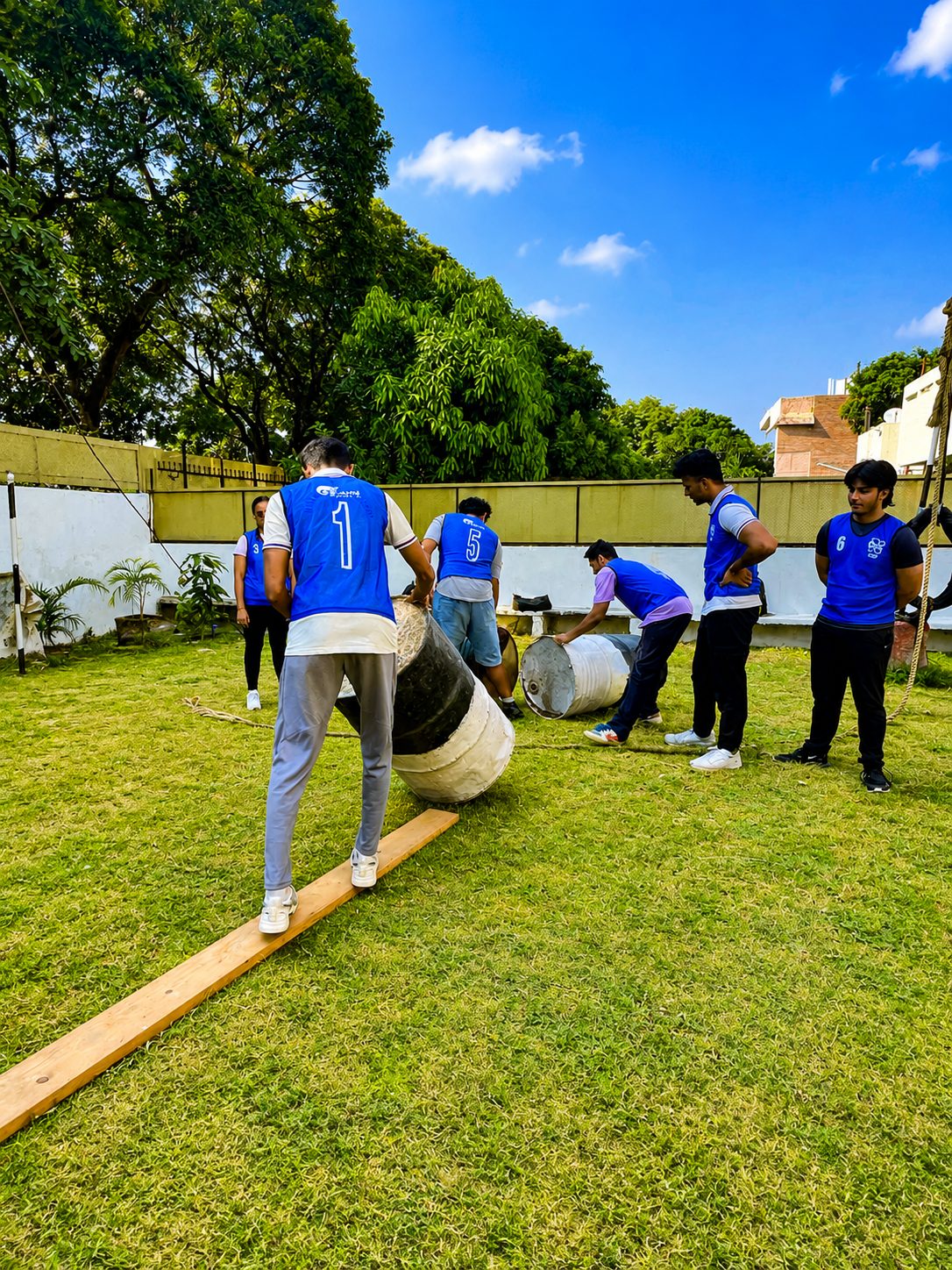 SSB GTO ground task — NCA Academy Chandigarh candidates on the drum balance task